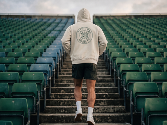 Sidelined Society heavyweight cream hoodie photographed on model
