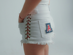 Arizona Wildcats women’s white denim game day shorts with side lace-up detail and frayed hem